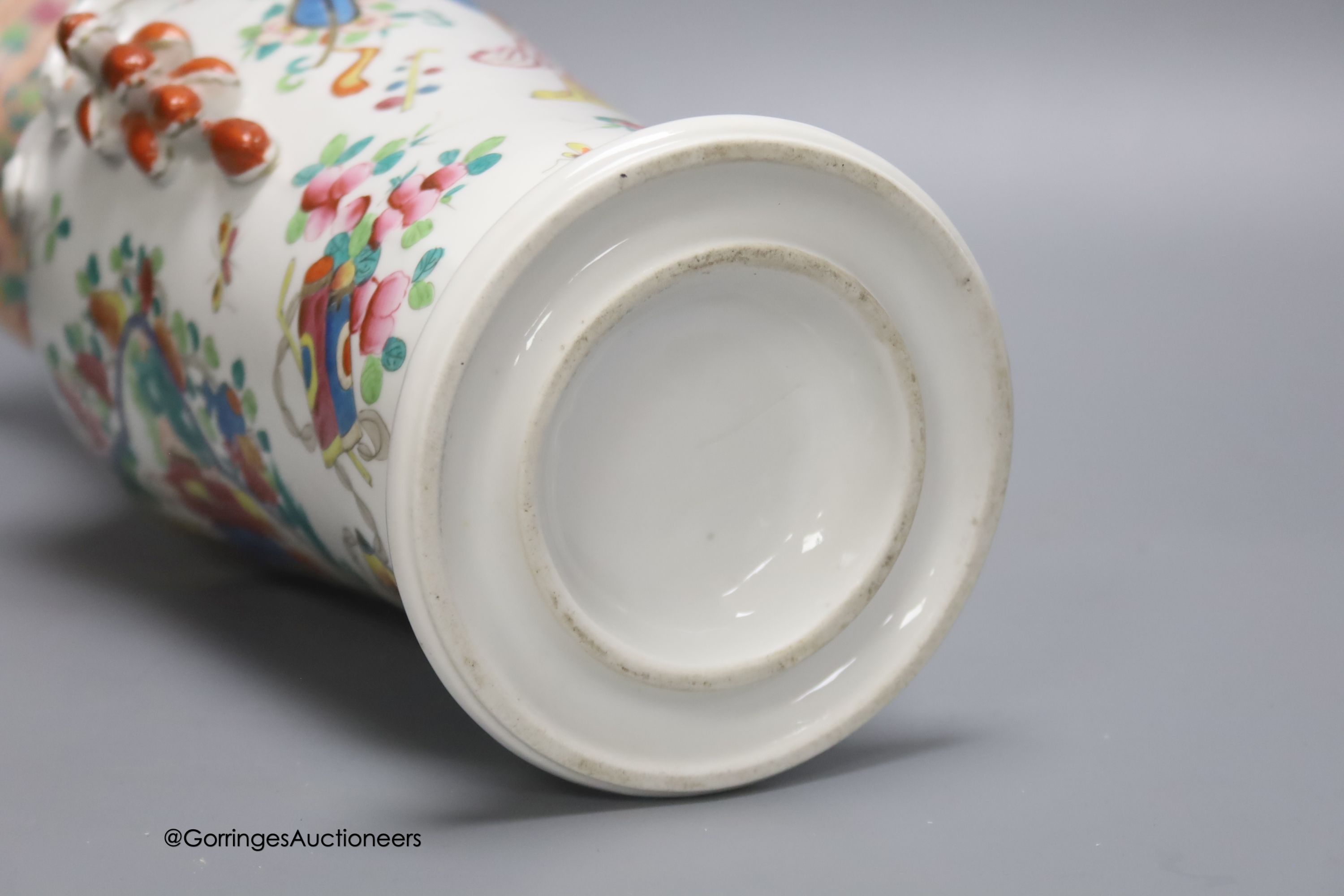 A 19th century French porcelain vase, enamelled in Chinese famille rose style, 38cm